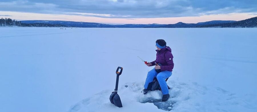 Arctic Tent Sauna Experience with Ice Swimming - A hot tent beside Lake Inari