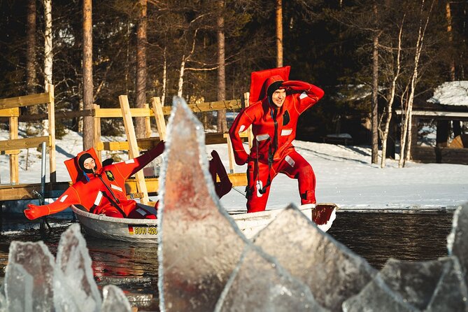 Daytime Arctic Ice-Floating in Rovaniemi, Small-Group - Warming up beside the fire