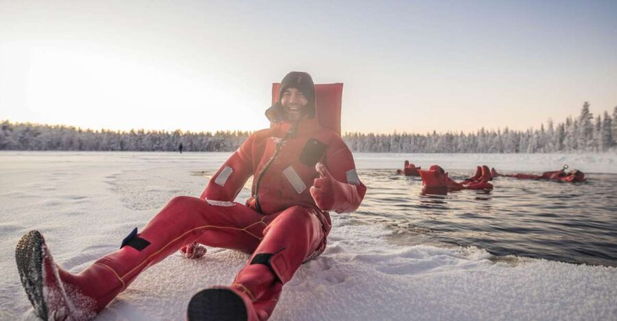 Daytime Ice Floating Rovaniemi, Frozen Lake Experience - Getting ready in the thermal suit