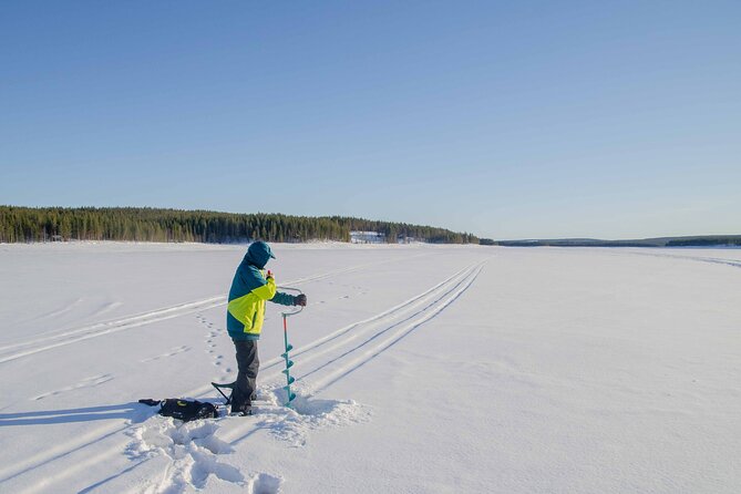 First Ice Fishing Experience in Rovaniemi - Drilling the hole and learning the fishing method