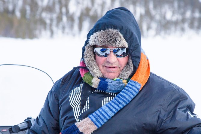 From Ivalo: Ice Fishing Safari to Lake Inari, reindeers & lunch - Fire-cooked comfort after the cold