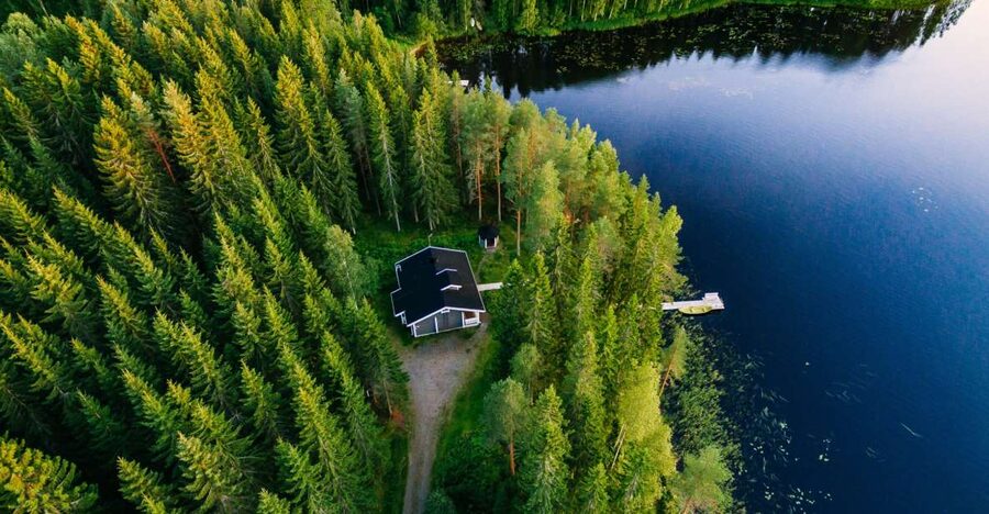 From Rovaniemi: Midnight Sun Forest Lake Float - Reaching the forest lake