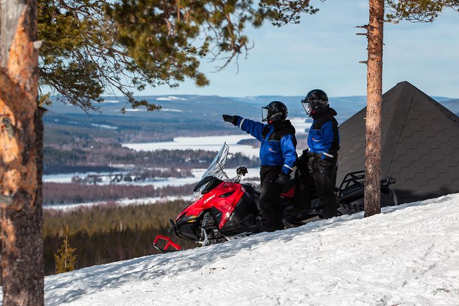 Full Day Snowmobile Safari into the Lappish Wilderness in Rovaniemi - A Lappish lunch beside the fire