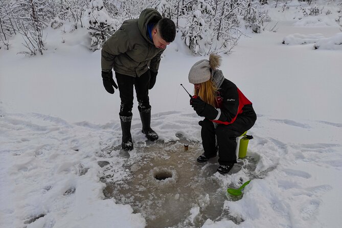 Half-Day Husky Safari and Salmon Ice Fishing Experience - Husky sledding through the snow