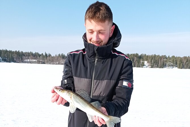 Ice fishing experience with Backpacker Helsinki Tour - Finnish sausage and a fire to finish