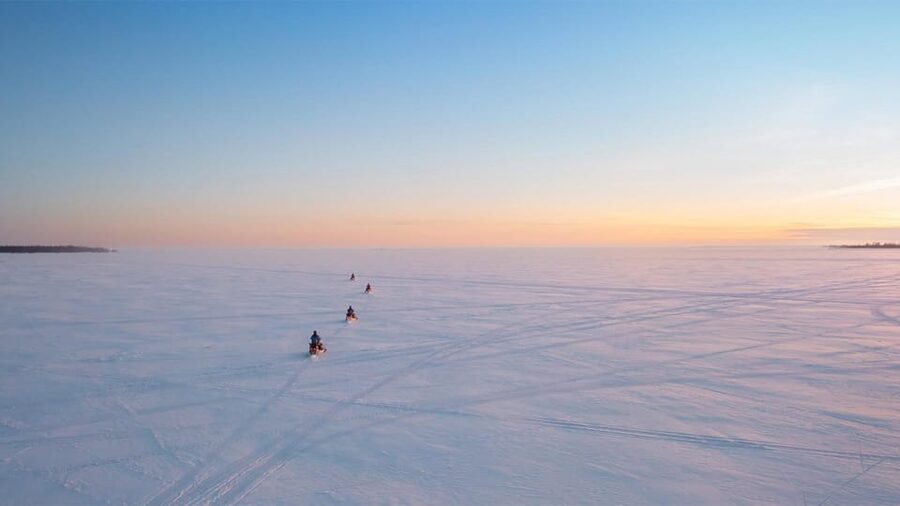 Kemi-Tornio: Ice Fishing Safari with Snowmobiles - Two people, one snowmobile, and a turn at the handlebars