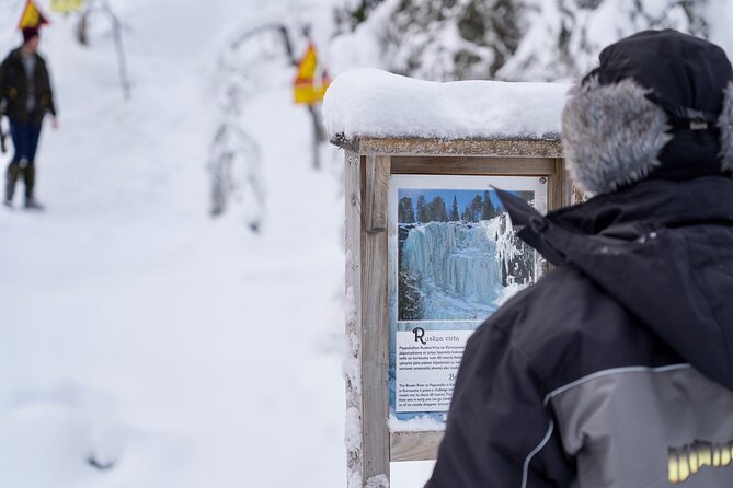 Korouoma Frozen Waterfalls Hike - Walking through snow-covered forest