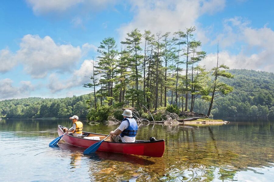 Lapland: Canoeing Trip with Reindeer and Husky Farm Tour - Canoeing through the forest to a quiet lake