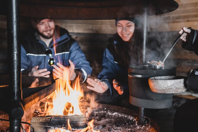 Lappish Lunch Break -Snowmobiling, ice fishing and tasty food - What the guides add to the day