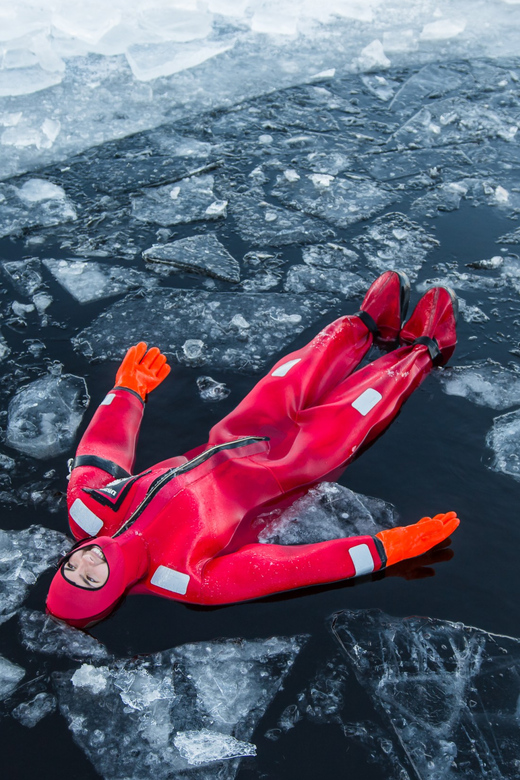 Levi: Arctic Ice Floating Adventure - Getting into the water in a thermal suit
