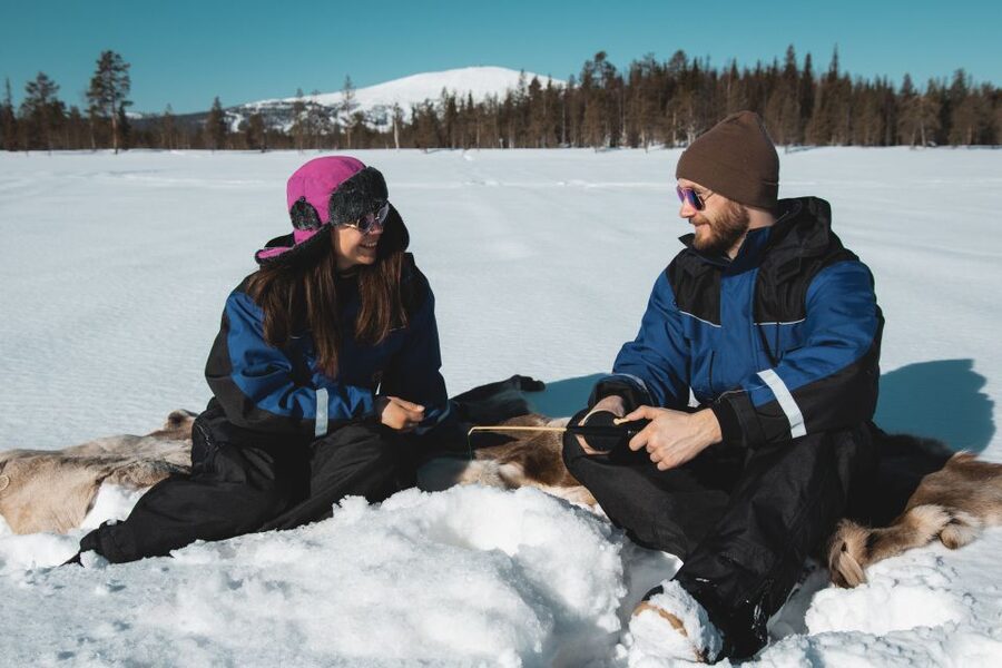 Levi: Finnish Ice Fishing Tour by Car - Campfire, hot drinks, and a warm finish