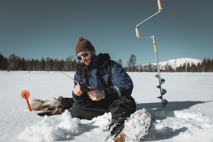 Levi: Finnish Ice Fishing Tour by Car - Getting dressed for the Finnish cold