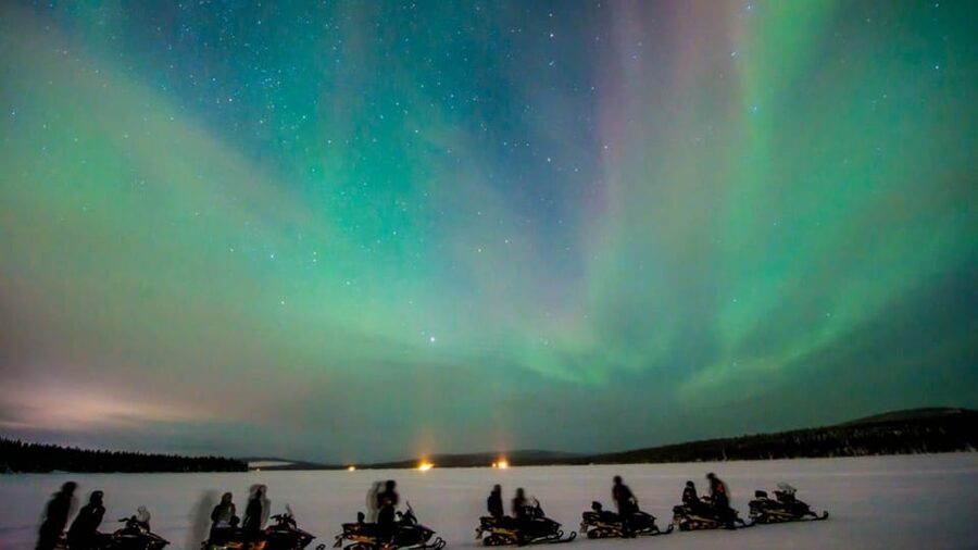 Levi: Northern Lights Snowmobile Safari and Campfire Picnic - Sausages and tea beside the fire
