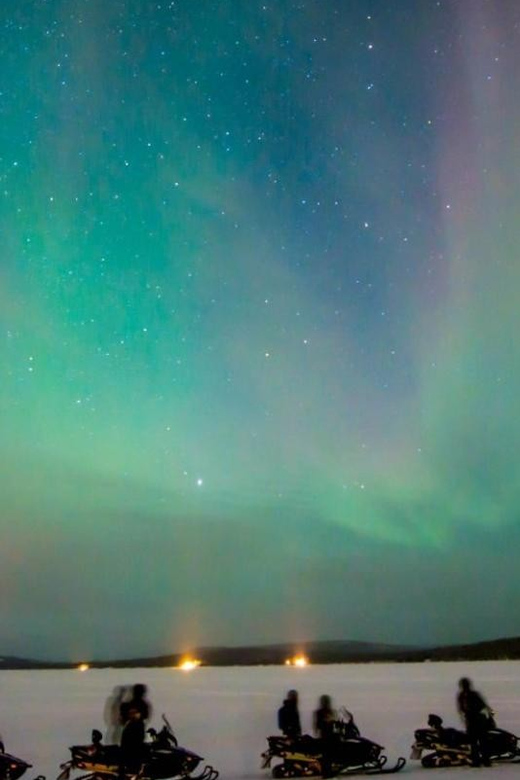 Levi: Northern Lights Snowmobile Safari and Campfire Picnic - Riding through the forest after dark