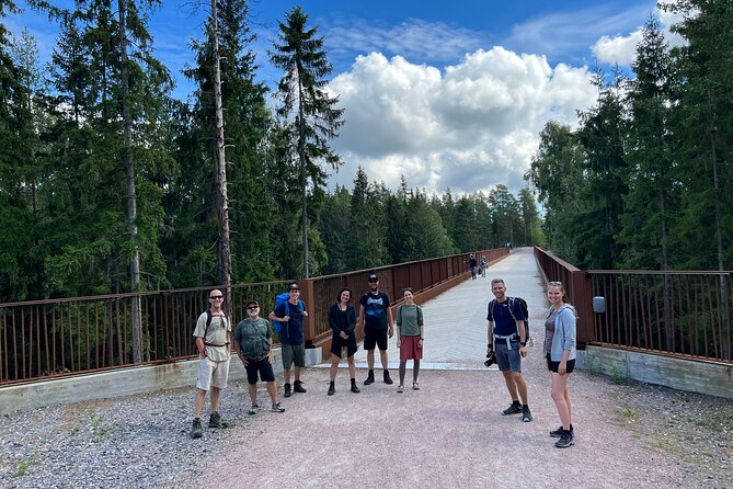 National Park Hike & Finnish Smoke Sauna Experience with Campfire Lunch - From Kiasma to the Finnish forest