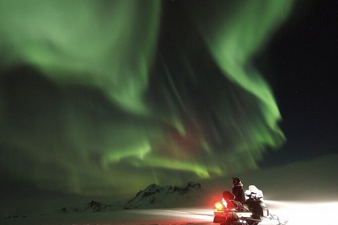 Northern Lights Snowmobile Hunt - Snowmobiling into the Finnish night