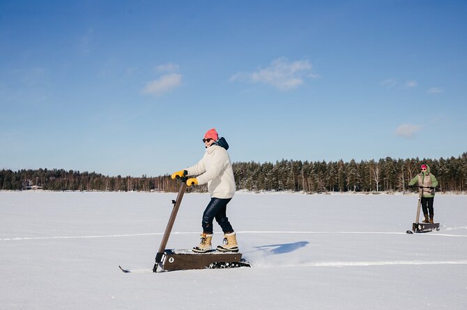 Private Driving Snow Scooters Experience in Finland - Into the Taiga forest on a prepared trail