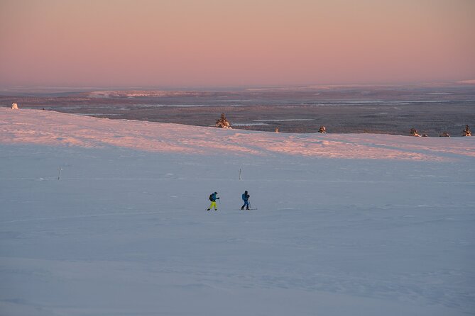 Private Snowshoe or Ski Adventure in Lapland from Rovaniemi - Following tracks through the snowy forest