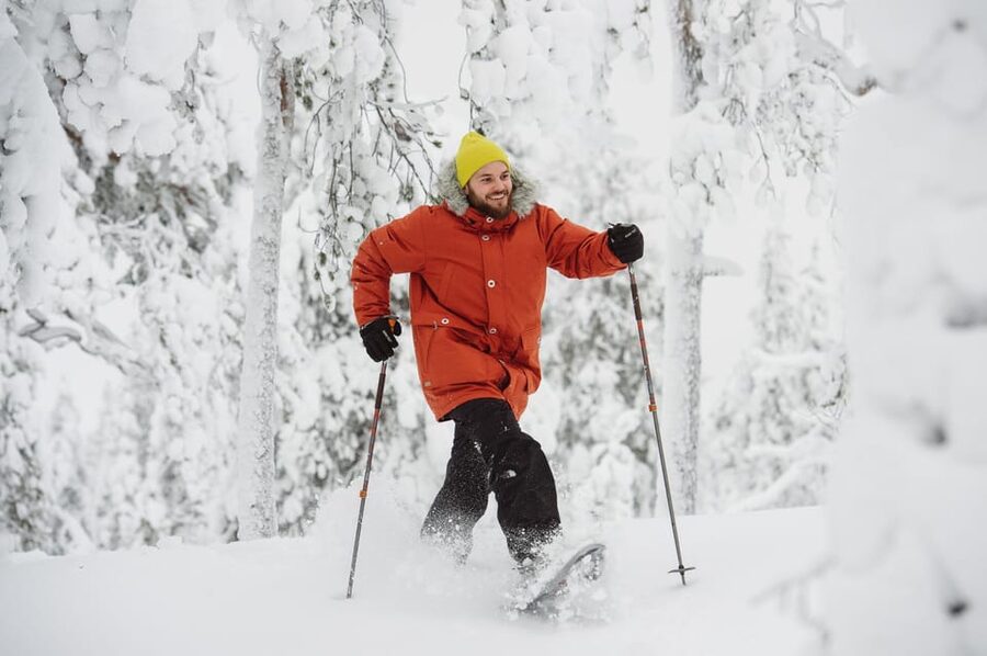 Pyhätunturi: Scenic Snowshoeing Tour in Finnish Lapland - Riding PyhäExpress toward the fell top