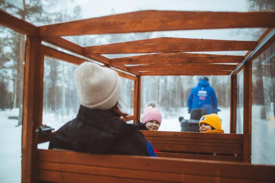 Rovaniemi: Family Snowmobiling Trip - Getting dressed for Lapland