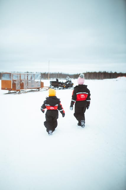 Rovaniemi: Family Snowmobiling Trip - The safety briefing and first ride