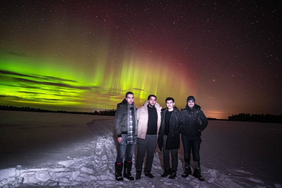 Rovaniemi: Guaranteed Ultimate Aurora Hunt with Photographer - Waiting under dark skies