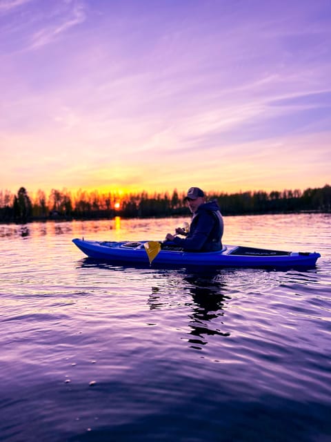 Rovaniemi: Guided Wilderness Kayaking Adventure - Paddling through Arctic summer scenery