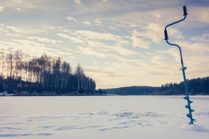 Rovaniemi: Ice Fishing from Private Lakefront Property & BBQ - Fishing on a frozen lake outside Rovaniemi