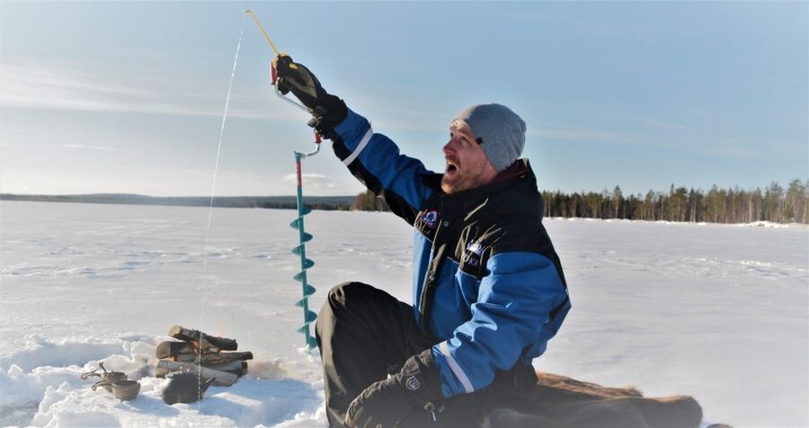 Rovaniemi: Ice-Fishing like a Finn - Drilling the first hole in the ice