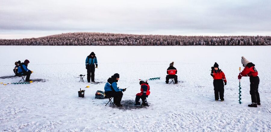 Rovaniemi: Quad Bike Ride and Ice Fishing - Salmon, bread, and blueberry juice by the fire