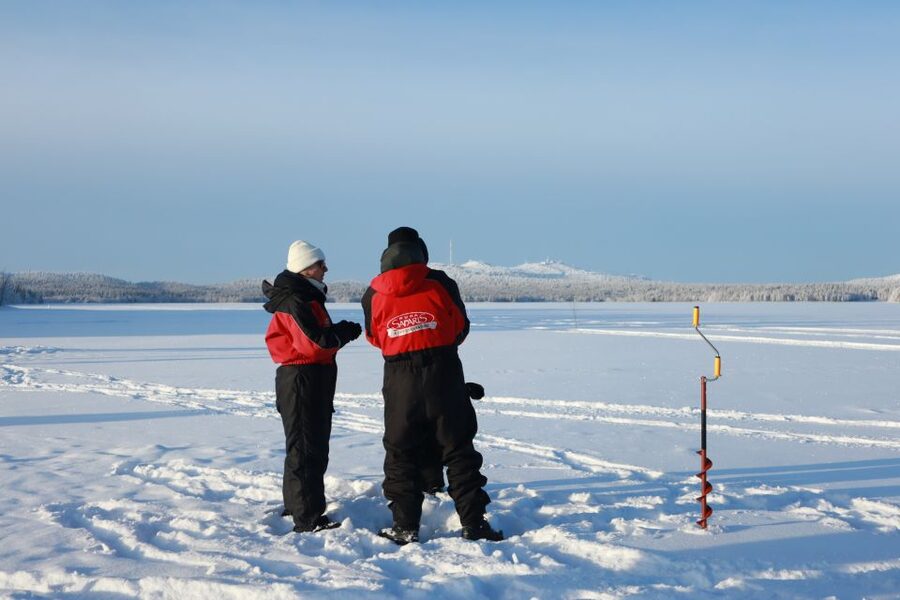 Ruka: Ice fishing trip - Drilling through the ice for the first time