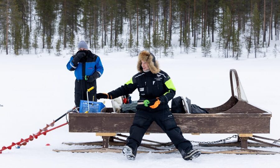 Saariselkä: Ice Fishing Safari by Snowmobile - Learning to Drill Through the Ice