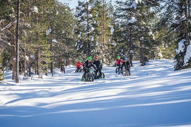 Scenic electric fat bike group ride in Rovaniemi - Crossing Rovaniemi toward Lumberjack’s Candle Bridge