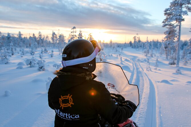Scenic Snowmobile Safari in Saariselkä - The quiet break with hot blueberry juice
