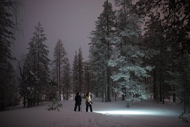 Ski Trekking under the Northern Lights - The campfire ending in a Finnish shelter