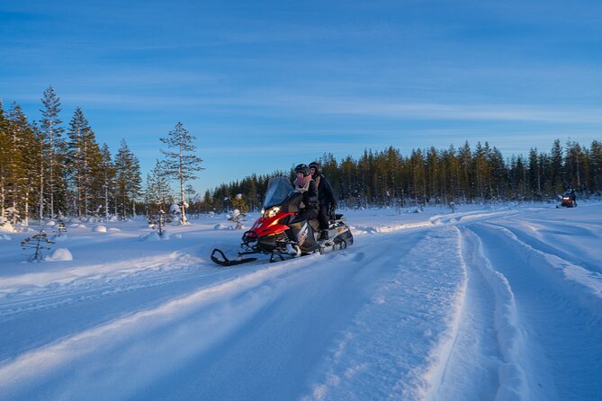 Small-Group Snowmobile Experience in Rovaniemi - Riding through the snowy forest