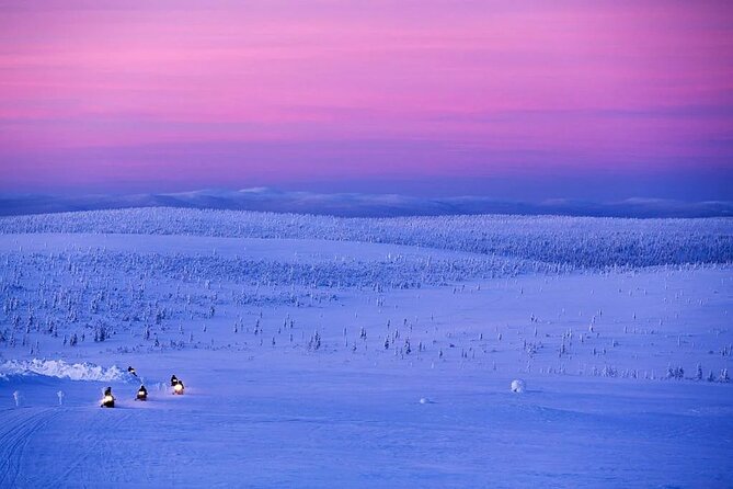 Snowmobile and Ice Fishing Experience - Snowmobile Riding Through Forest and Frozen Openings