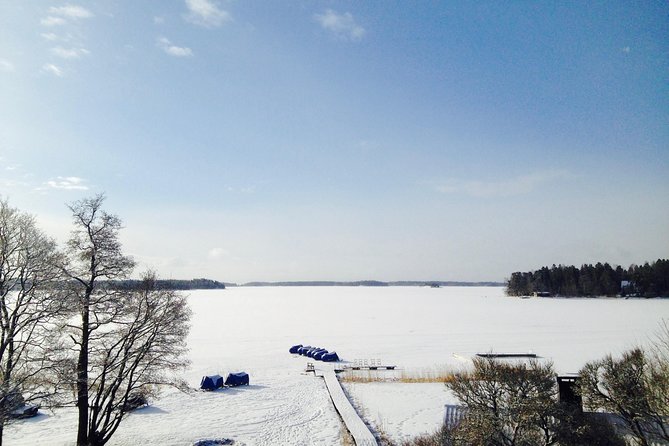 Snowmobile Safari in Helsinki Archipelago with Lunch - The island stop, fire, and Finnish lunch