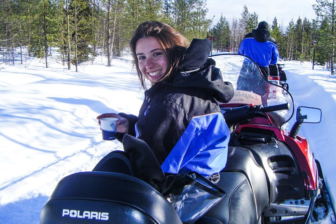 Snowmobile Safari in the Forest - Who Will Enjoy This Day Most?
