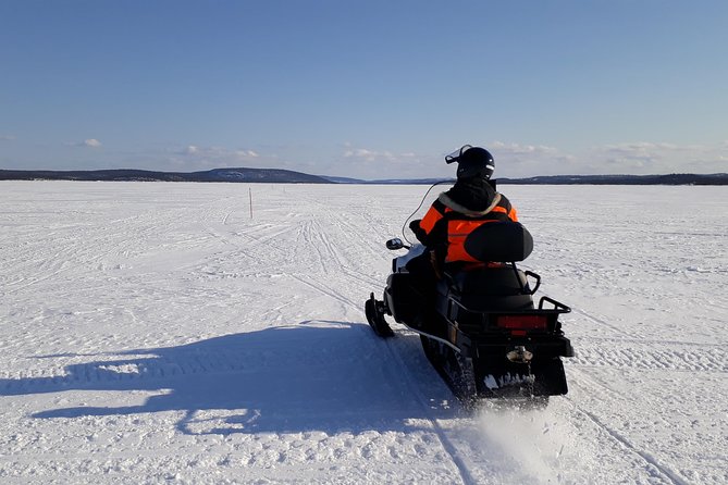 Snowmobile Safari to Lake Inari, meet & feed Reindeers, Lunch - Learning to handle a two-person snowmobile