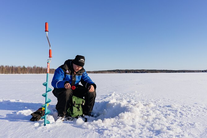 Snowmobiling and ice fishing in Apukka Resort, Rovaniemi - Children ride in a sledge, not on the snowmobile