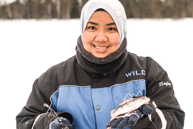 Snowshoeing and Ice Fishing Tour - Fire, sausages, and Finnish winter comfort