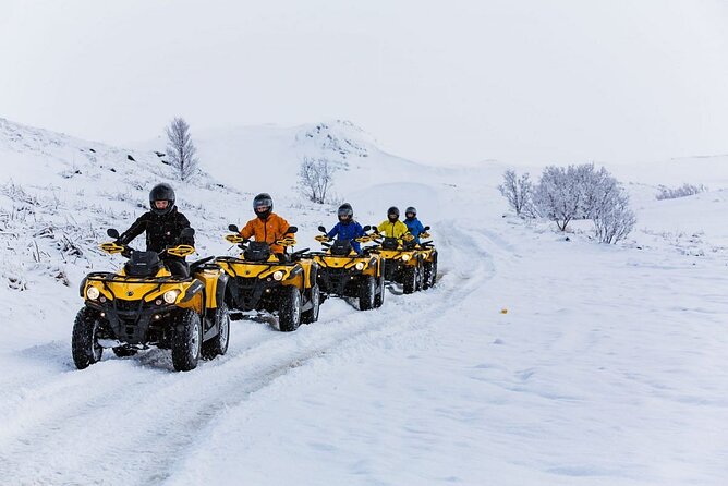 Winter Quad Bike Ride in the Arctic Circle from Rovaniemi - Riding into the snowy forests outside Rovaniemi